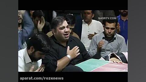 اشکهای همسروفرزند«شهیدمدافع حرم»کنارپیکر پدر بعدازیکسال