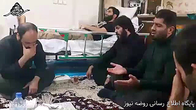 روضه خوانی روح الله بهمنی کنار بستر جانباز مدافع حرم